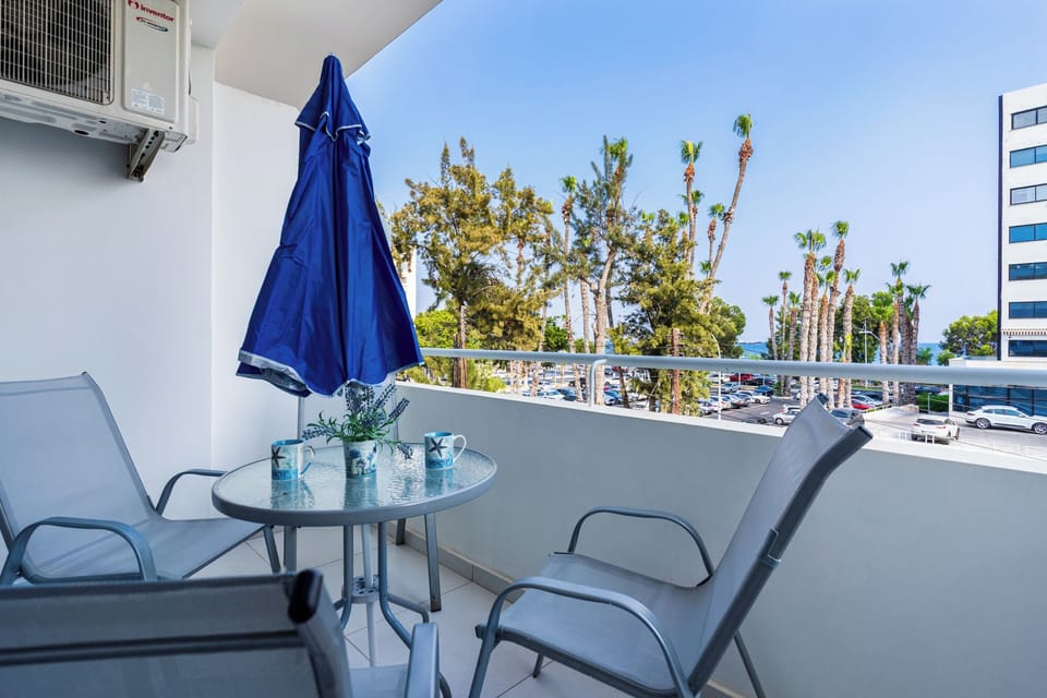 Apartment, Balcony, Sea View | Outdoor dining