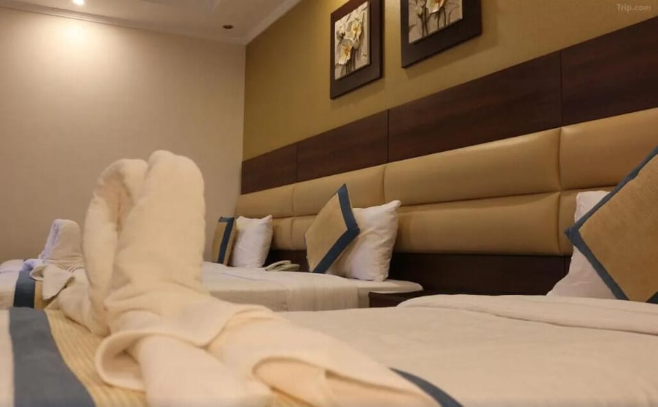 Premium bedding, memory foam beds, in-room safe, blackout drapes