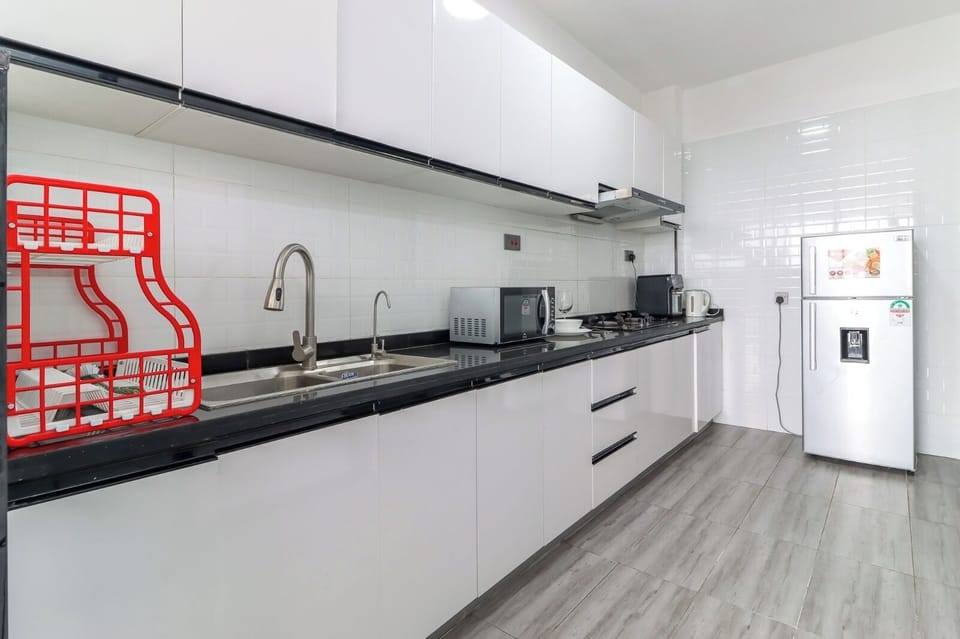Classic Apartment, Balcony, City View | Private kitchen | Coffee/tea maker, full-size fridge, microwave, oven