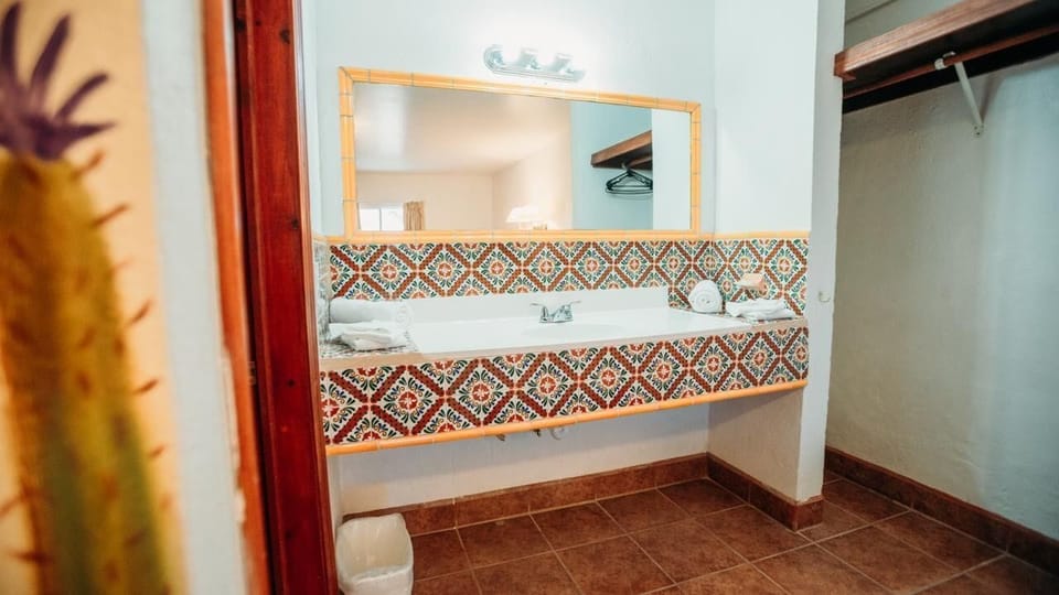 Classic Quadruple Room, Multiple Bedrooms | Bathroom | Free toiletries, hair dryer, towels, soap