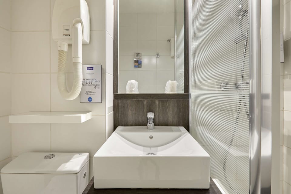 Shower, eco-friendly toiletries, hair dryer, towels