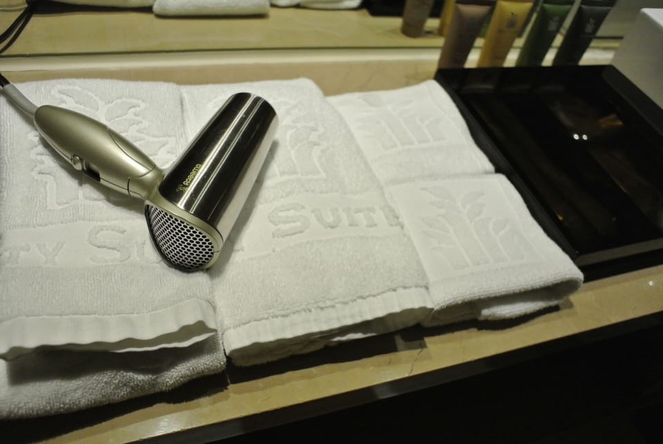 Deep soaking tub, rainfall showerhead, hair dryer, towels
