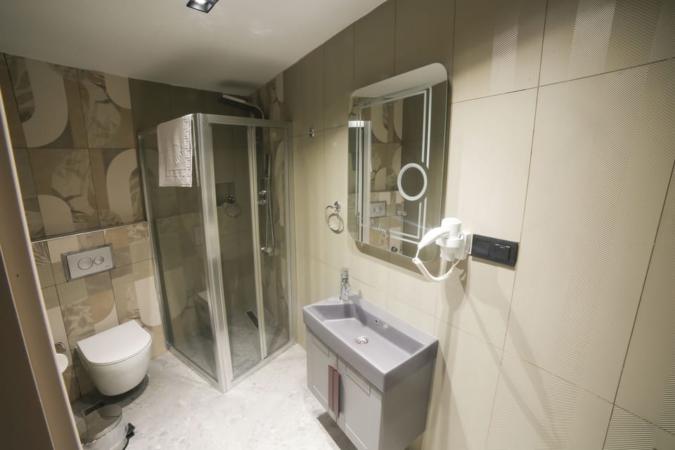 Hair dryer, towels, soap, shampoo