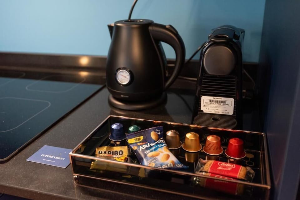 Deluxe Apartment, Balcony, City View | Coffee and/or coffee maker