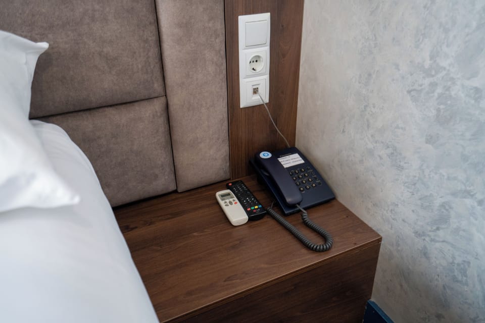 Double or Twin Room, City View | In-room safe, desk, blackout drapes, iron/ironing board