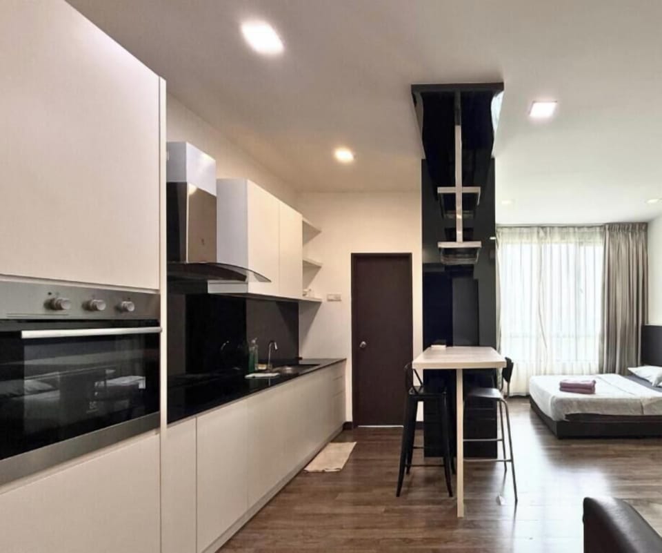 Deluxe Apartment | Living area | 42-inch Smart TV with cable channels