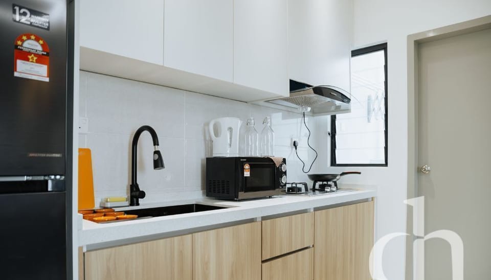 Apartment, 3 Bedrooms | Private kitchen | Fridge, stovetop, dining table