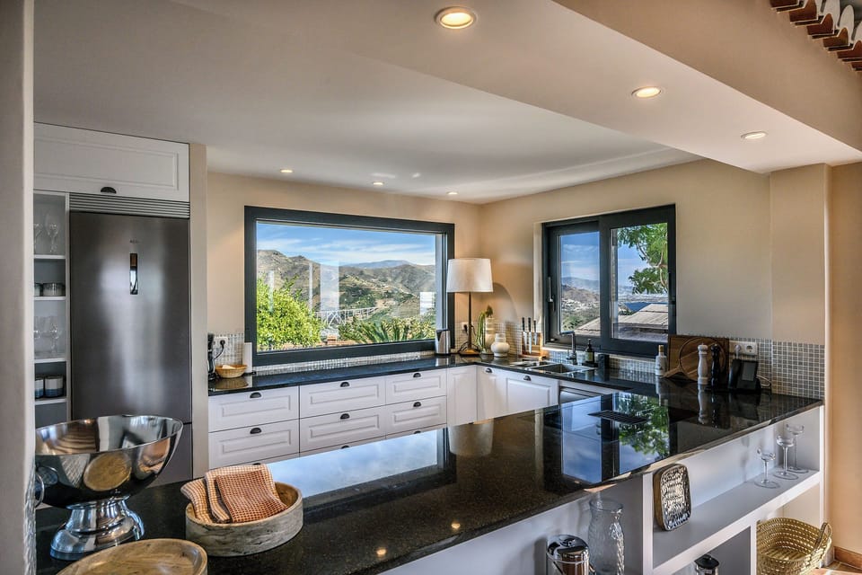Villa Mango | Private kitchen | Coffee/tea maker, full-size fridge, microwave, oven