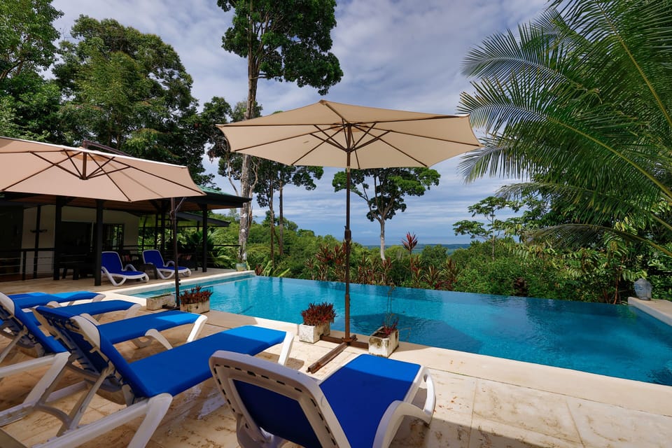 Exclusive Villa, Private Pool, Ocean View | Living area | 50-inch Smart TV with cable channels
