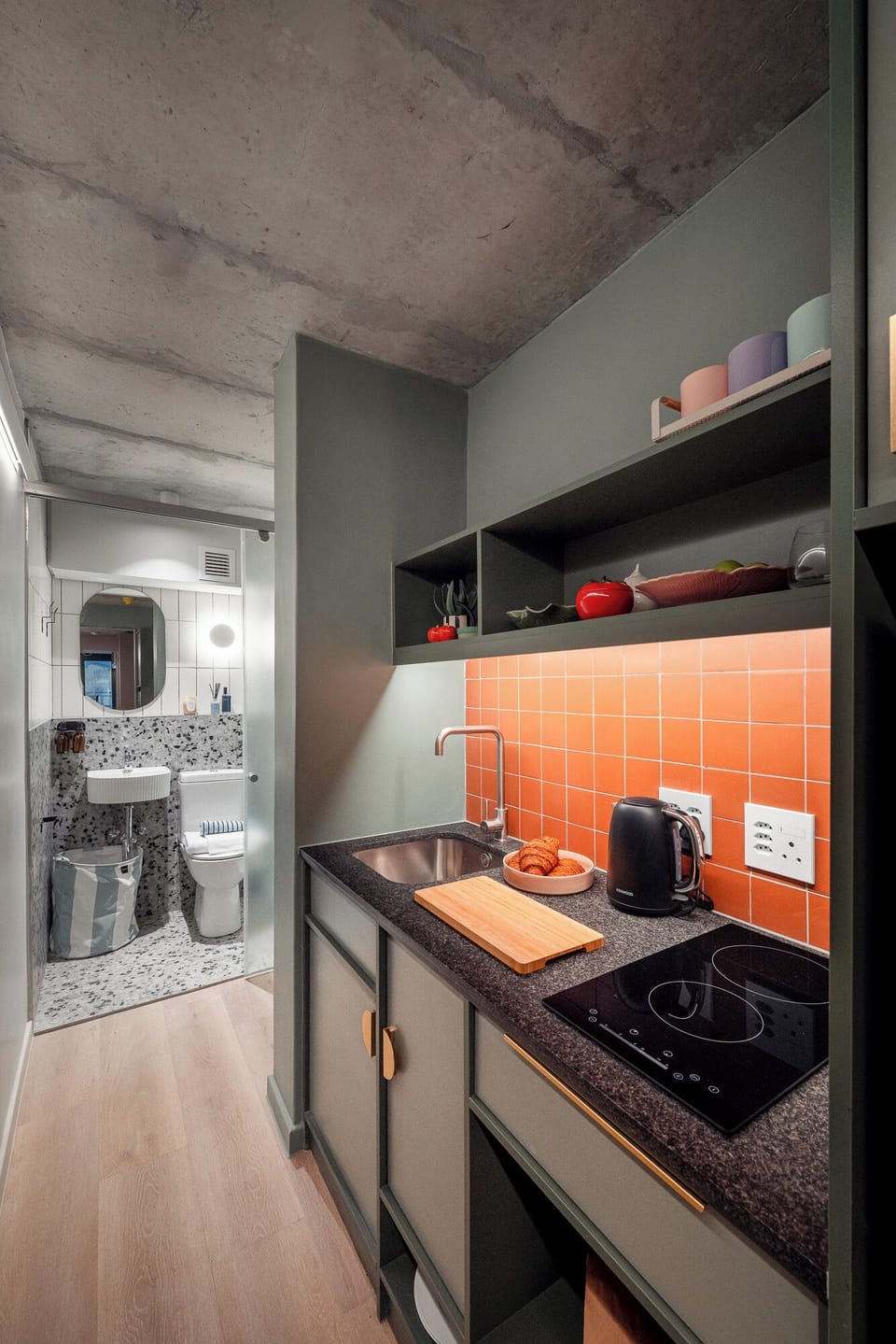Full-size fridge, microwave, stovetop, cookware/dishes/utensils