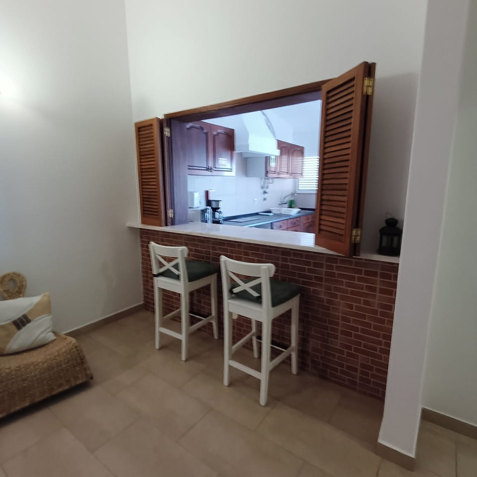 Apartment, 1 Bedroom, Garden View | Living area | 24-inch flat-screen TV with cable channels, TV