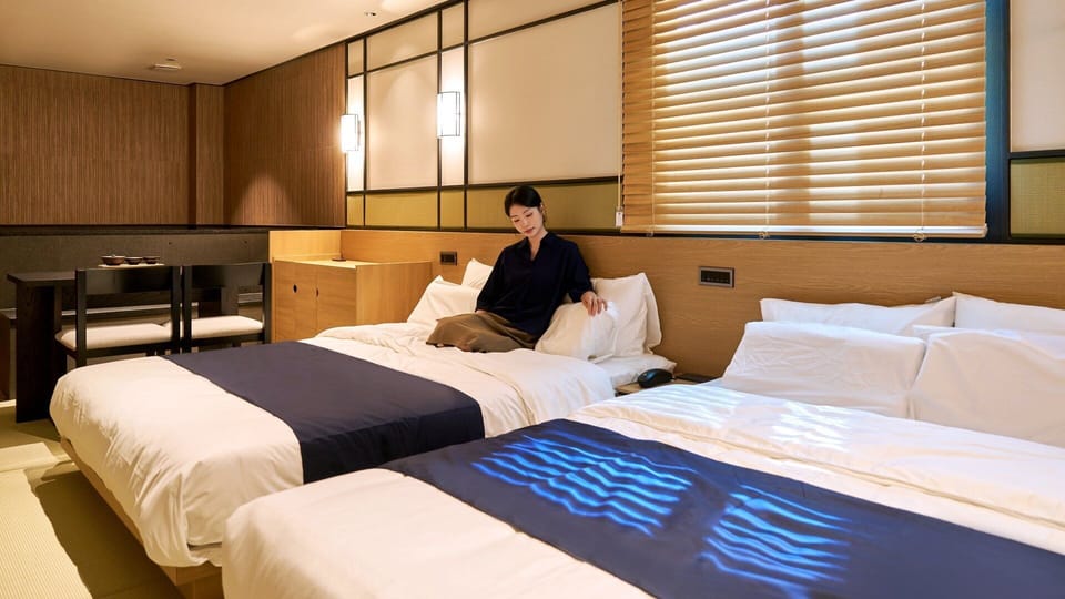 Signature Suite | Premium bedding, blackout drapes, soundproofing, WiFi (free)