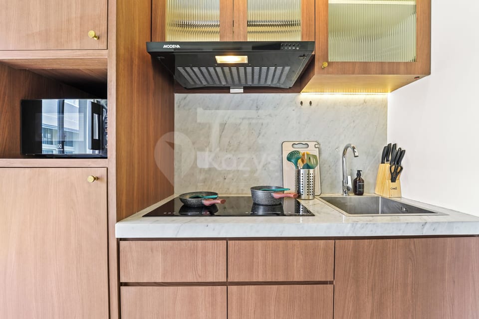 Apartment, 1 Bedroom, Pool View | Private kitchen | Coffee/tea maker, full-size fridge, microwave, stovetop
