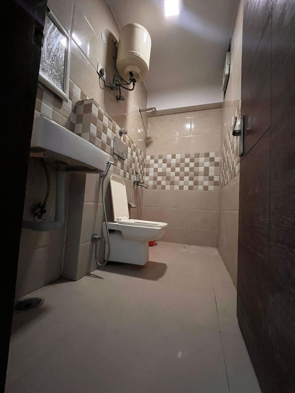 Shower, towels, soap, toilet paper