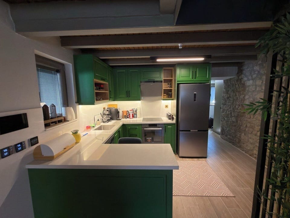 Luxury Duplex, City View | Private kitchen | Highchair