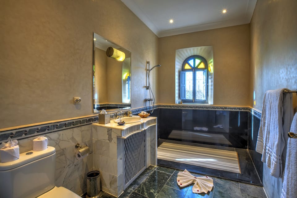 Shower, free toiletries, hair dryer, bathrobes