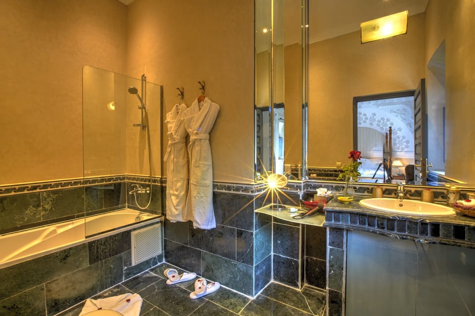 Shower, free toiletries, hair dryer, bathrobes