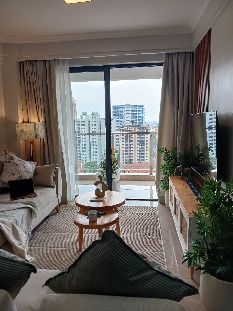 Deluxe Apartment, Balcony, City View | Living area | 32-inch Smart TV with digital channels