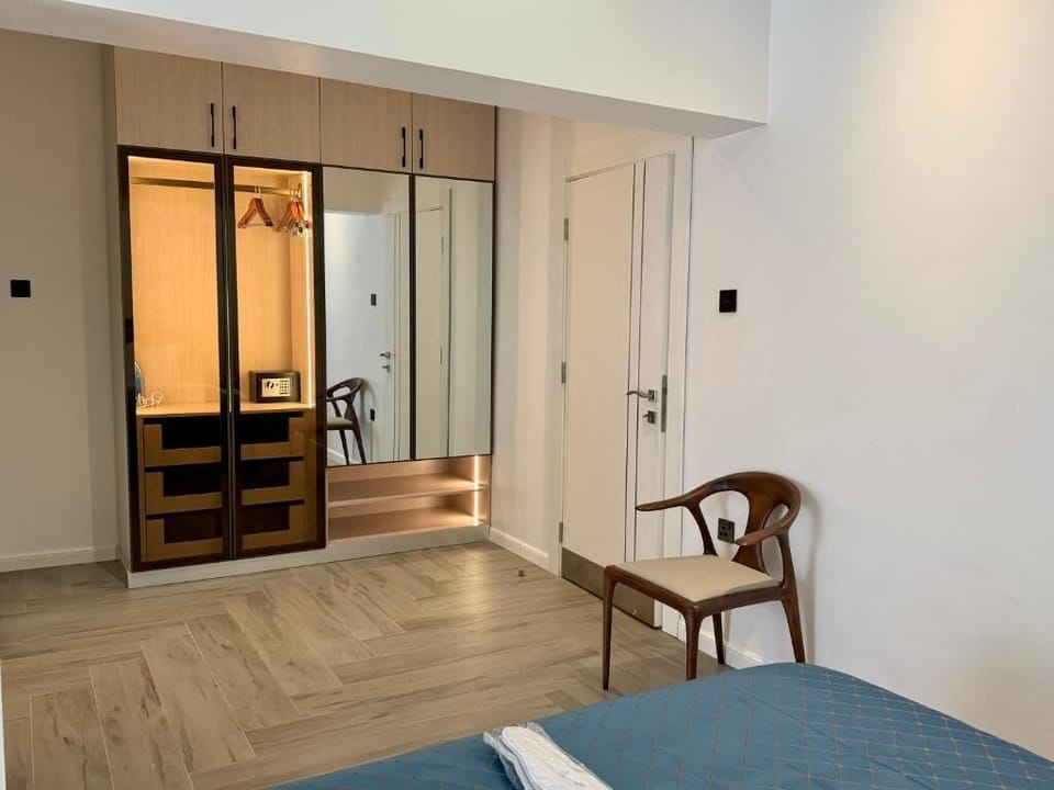 Family Apartment, Balcony, City View | In-room safe, desk, laptop workspace, blackout drapes