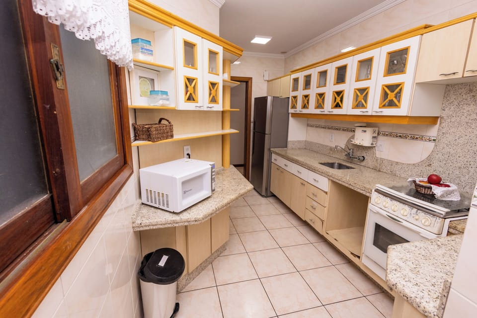 Family Apartment, 4 Bedrooms, Kitchen, City View | Private kitchen | Full-size fridge, microwave, oven, stovetop