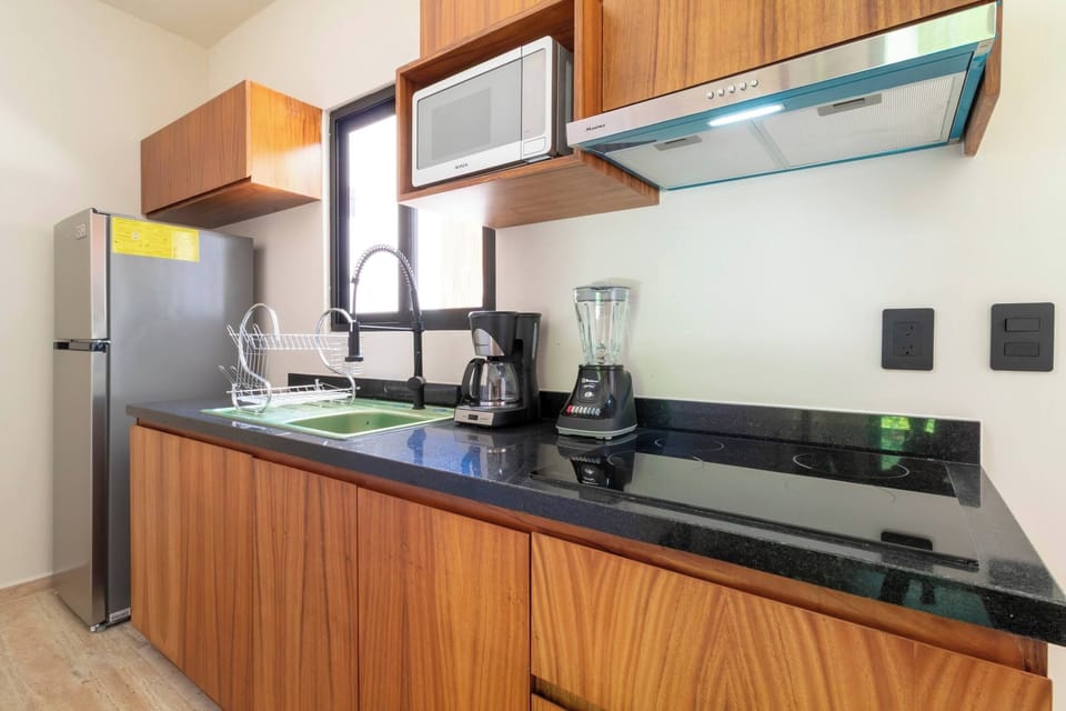 Deluxe Apartment, Patio | Private kitchen