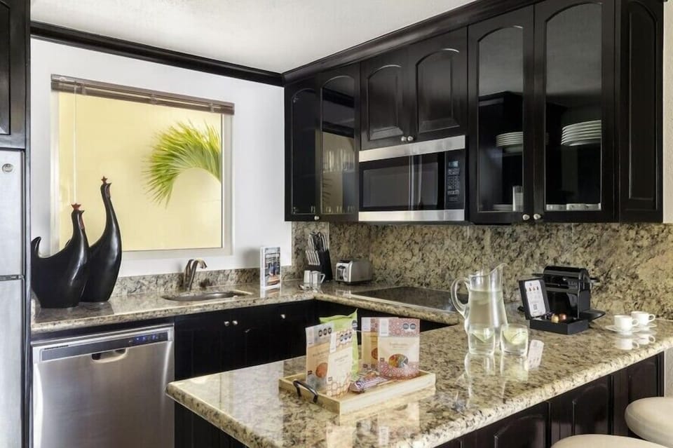 Suite, 2 Bedrooms, Balcony, Sea View | Private kitchen | Espresso maker, coffee/tea maker, highchair