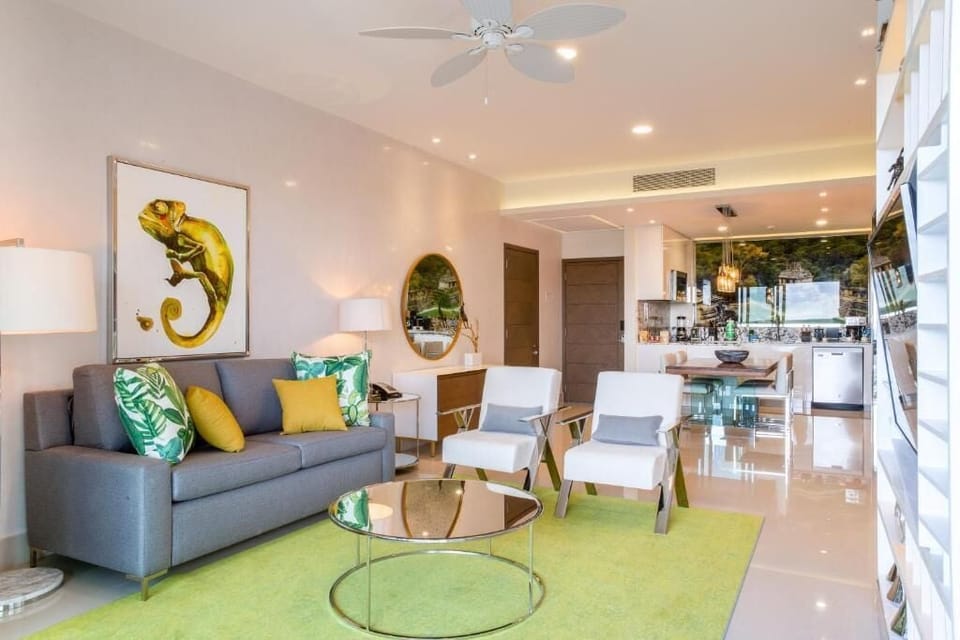 Suite, 2 Bedrooms, Balcony, Sea View | Living area | 50-inch Smart TV with premium channels