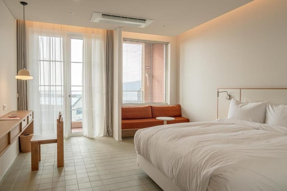 Standard Double Room, 1 King Bed, Balcony, Partial Sea View | In-room safe, blackout drapes, soundproofing, WiFi (free)