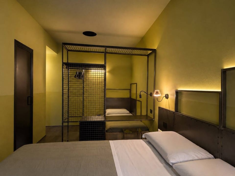 Superior Triple Room | Minibar, in-room safe, desk, laptop workspace