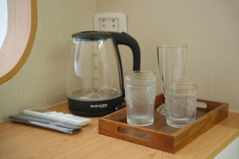 Double Room, Balcony, City View | Coffee and/or coffee maker