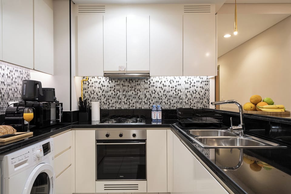 Luxury Apartment, Balcony, City View | Private kitchen | Coffee/tea maker, electric kettle, eco-friendly cleaning products