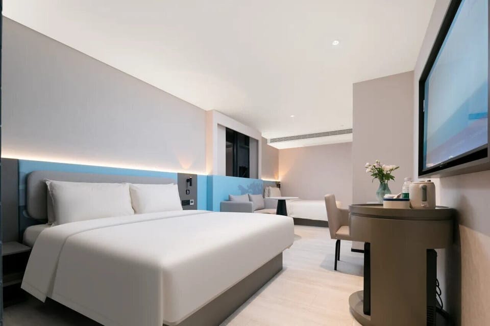 Family Triple Room, City View | Premium bedding, desk, laptop workspace, WiFi (free)