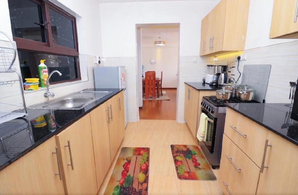 Deluxe Apartment, Balcony, City View | Private kitchen | Microwave, cookware/dishes/utensils