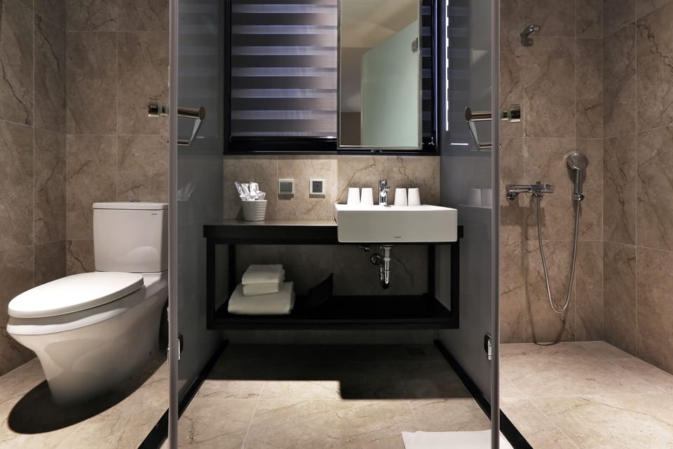Shower, free toiletries, hair dryer, slippers