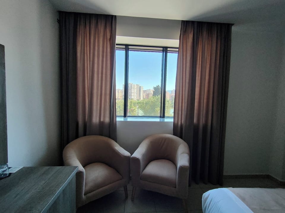 Double or Twin Room | Minibar, in-room safe, desk, laptop workspace