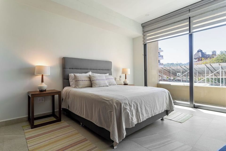 Deluxe Condo, Pool View | In-room safe, iron/ironing board, WiFi (free)