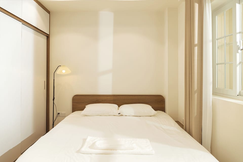 Deluxe Apartment, Balcony, City View | In-room safe, desk, laptop workspace, blackout drapes