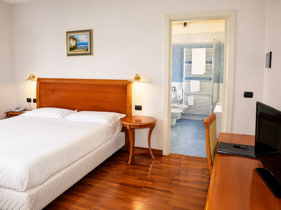 Double or Twin Room | In-room safe, cribs (surcharge), WiFi (free), bed sheets