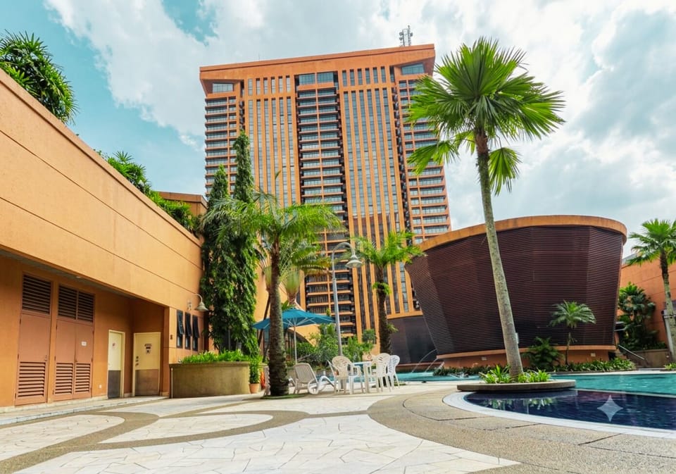 Deluxe Studio Suite, City View | Pool | Outdoor pool, pool umbrellas, sun loungers