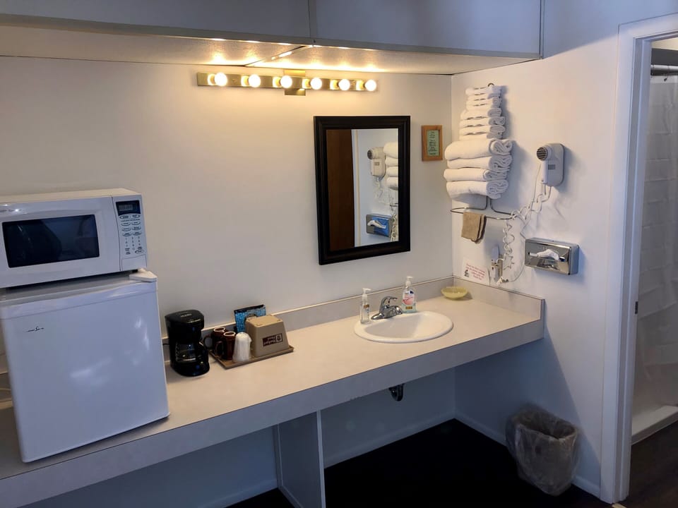 Standard Room, 2 Queen Beds, Second Floor | Bathroom | Combined shower/tub, deep soaking tub, free toiletries, hair dryer