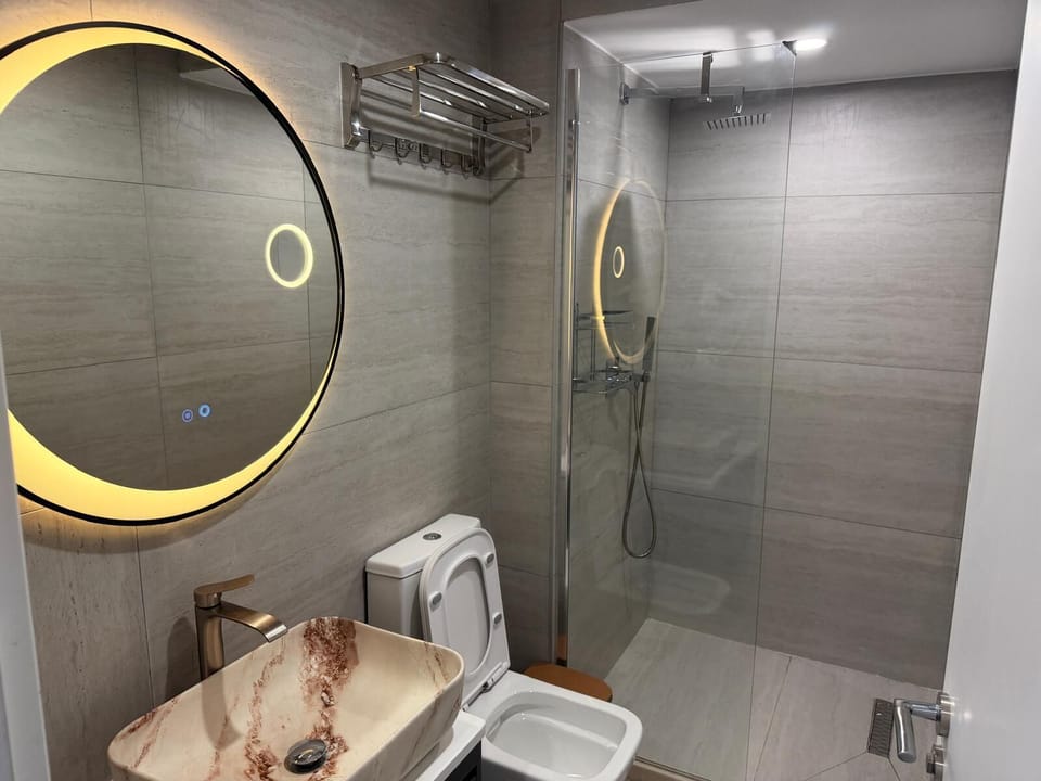 Shower, towels, soap, shampoo
