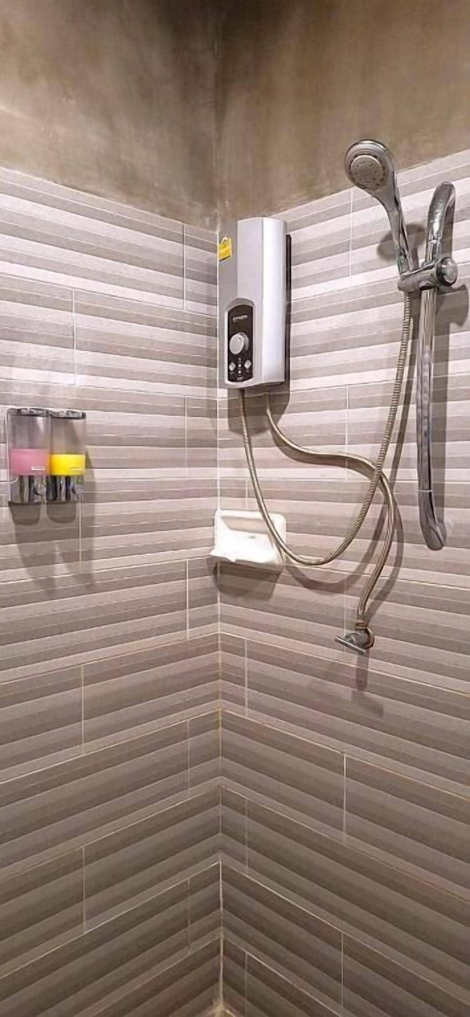 Shower, hair dryer, towels, toilet paper
