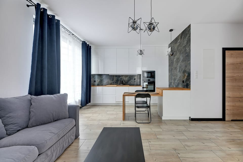 Deluxe Apartment, Balcony, Courtyard View | Private kitchenette | Coffee/tea maker, electric kettle, toaster, highchair