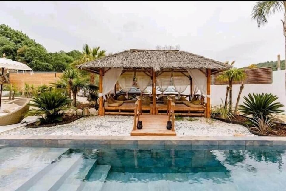 Luxury Chalet, Accessible Bathtub, Pool View | Pool | 2 outdoor pools, free cabanas, pool umbrellas