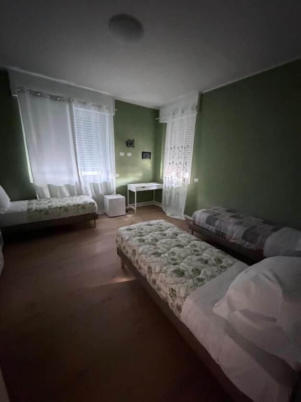 Family Triple Room, Patio, City View | Blackout drapes, soundproofing, iron/ironing board (on request)