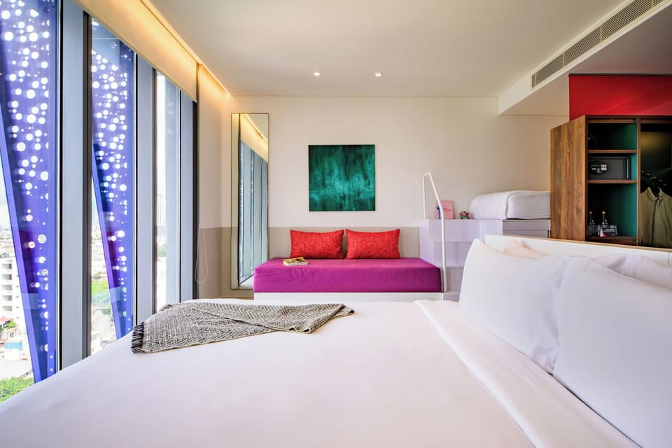 Premium bedding, down comforters, in-room safe, desk