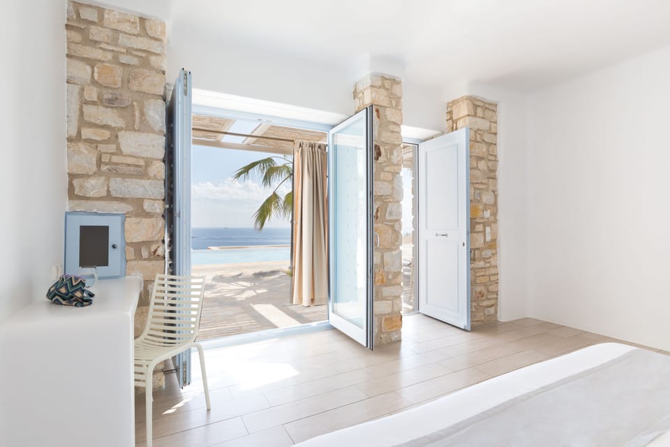 Junior Suite with Sea View | Premium bedding, minibar, in-room safe, desk