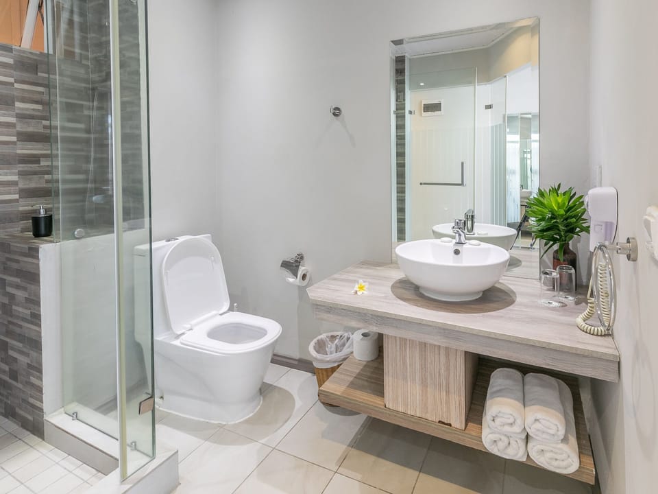 Comfort Room | Bathroom | Shower, rainfall showerhead, hair dryer, towels