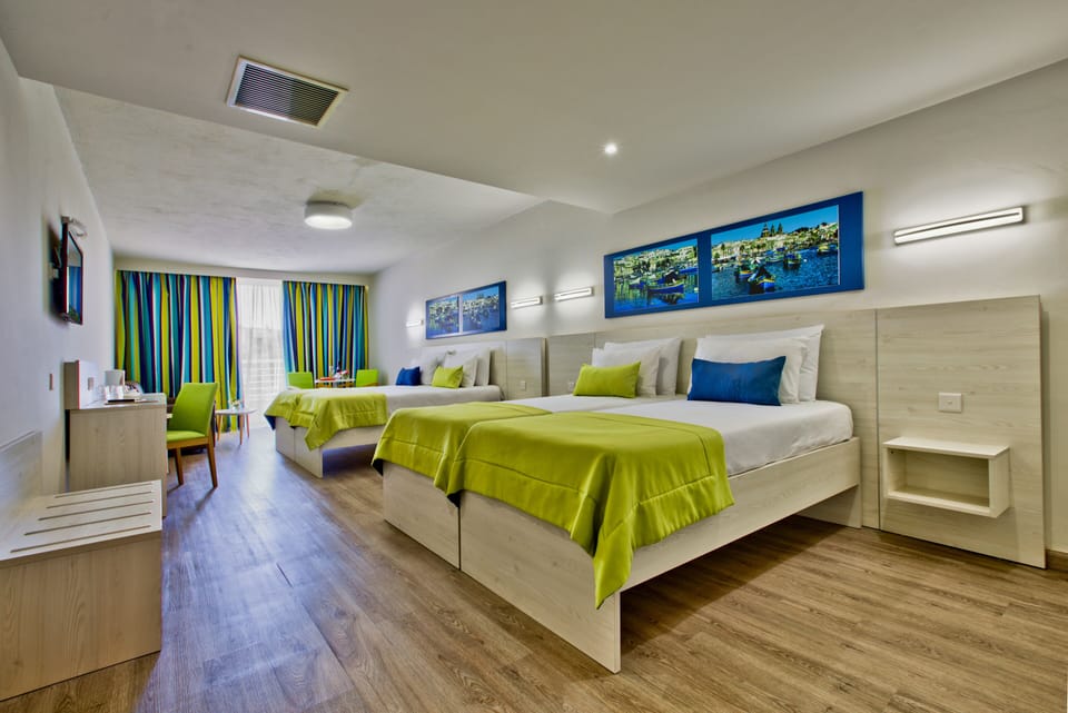 In-room safe, desk, WiFi (free), bed sheets
