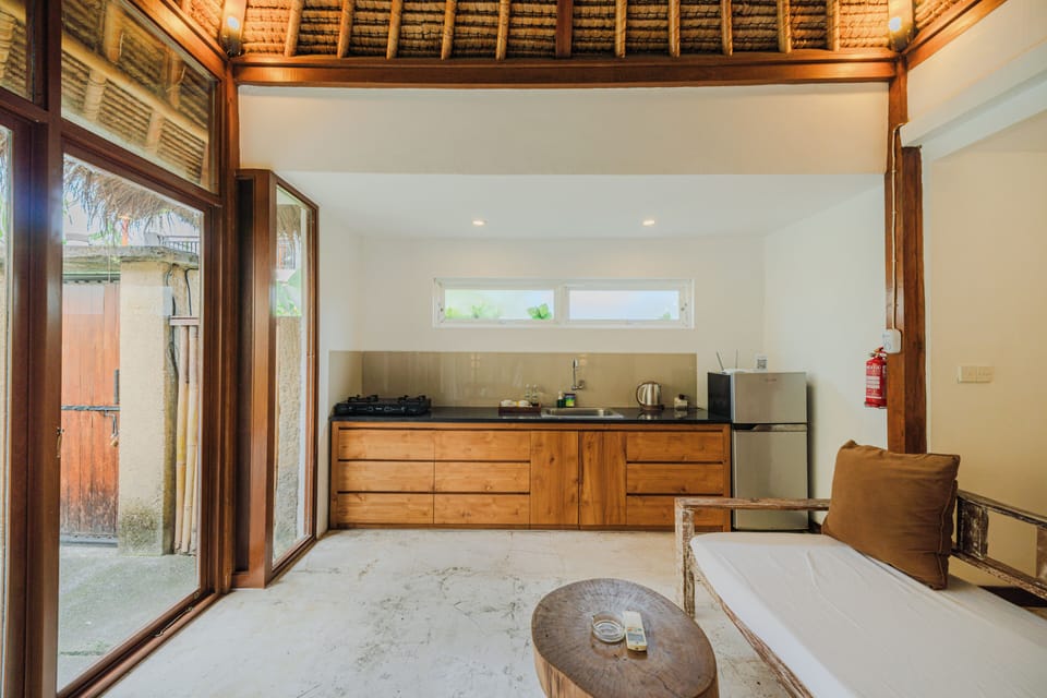 Superior Villa | Private kitchen | Fridge, stovetop, cookware/dishes/utensils